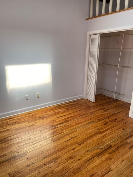 bedroom with closet space - 134 Washington St