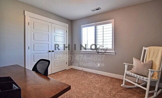 Building Photo - 7478 N Hutch Ln