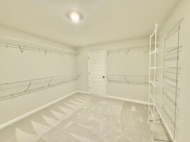 Building Photo - Stunning New 5BD, 5BA Garner Home with Lux...