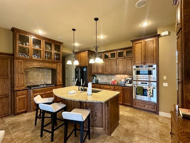 Building Photo - {9003} Wilshire Farms Reverse 1.5 Story Ho...