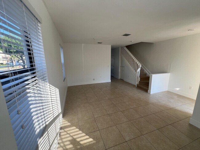 Building Photo - 9399 W 33rd Ln