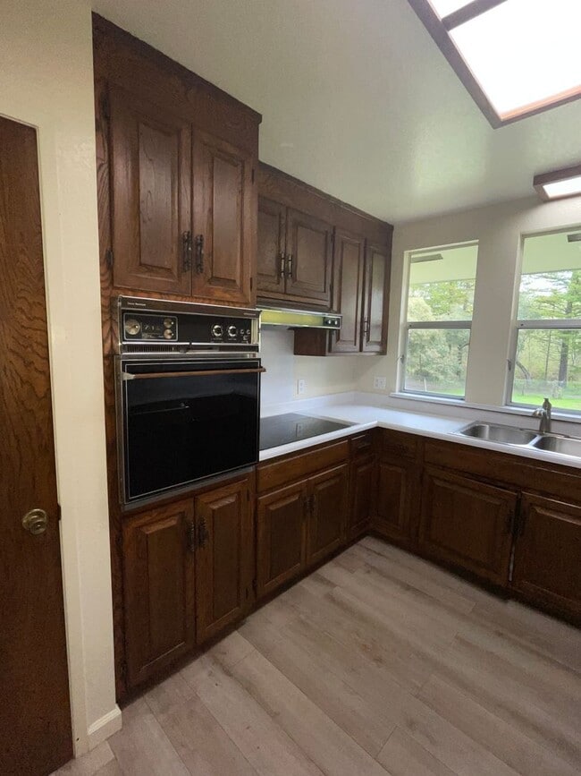 Building Photo - 1138 square feet Private Two bedroom, two bath upgraded home on 4 acres, 1 car garage, chicken co...