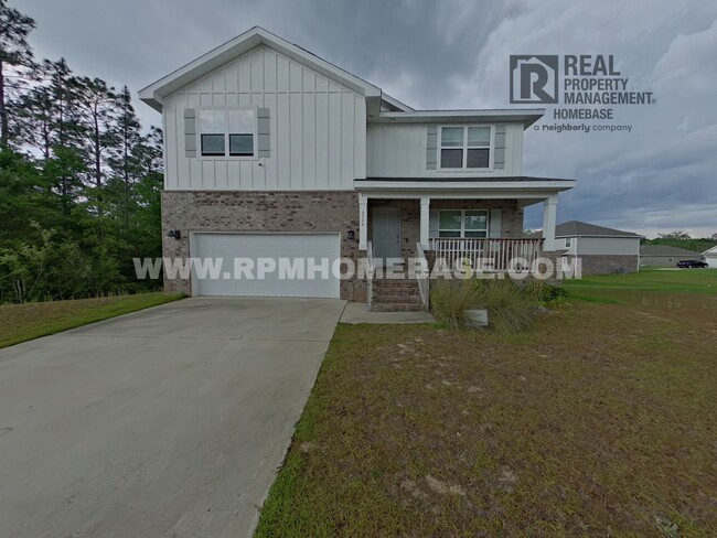 Primary Photo - Spacious 5-Bedroom Home in Heritage Planta...