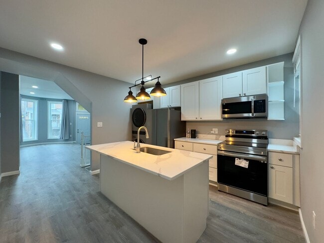 Building Photo - Spacious 4-Bedroom Townhome with Modern Amenities in Baltimore!