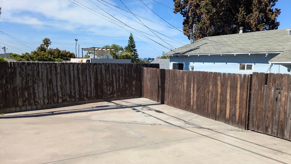 Large private car pad, 1 space included, 2nd space optional - 4379 Maryland St