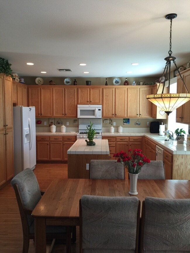 Building Photo - Spacious two-story home featuring 4 bedrooms and 3 full bathrooms (1 bedroom and 1 bathroom downs...