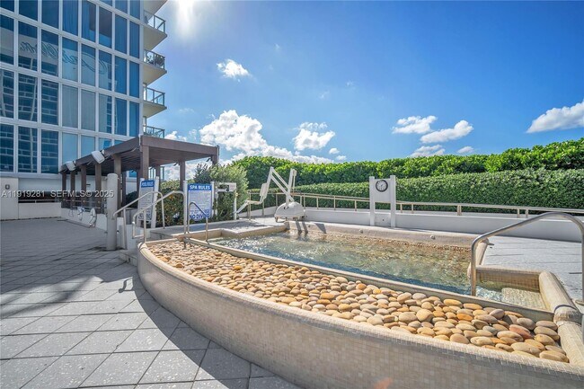 Building Photo - 6799 Collins Ave