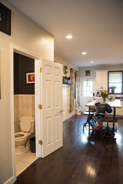 1st floor half bath off kitchen - 1623 Swain St