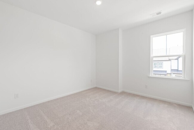 Building Photo - Welcome home to this stunning brand-new townhome in one of Indian Trail's newest and most desirab...