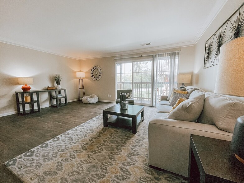 Spacious Living Room with Natural Light - The Preserve at Woodland