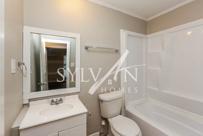 Building Photo - This 4 bedroom, 2 bathroom home is exactly...