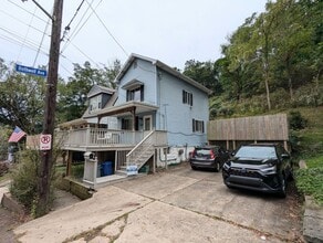 Building Photo - COMING SOON 2 Bedroom 1.5 Bathroom Single ...