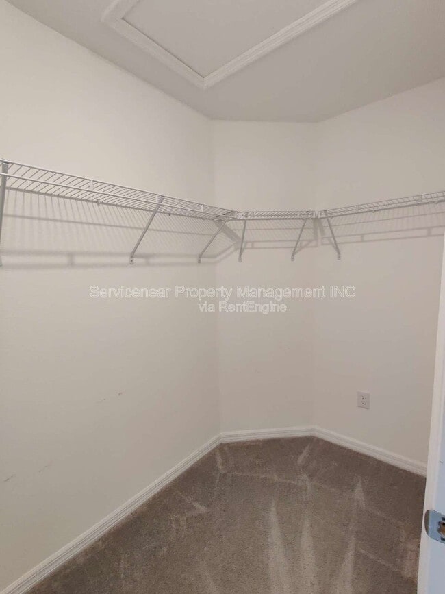 Building Photo - 7408 French Marigold Ave.