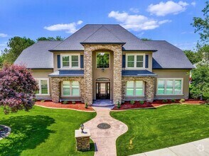 Building Photo - Exquisite 5-Bed, 6-Bath Waterfront Home fo...