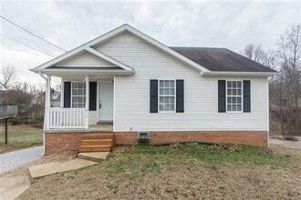 Building Photo - 4 bd 3 ba basement home close to everything