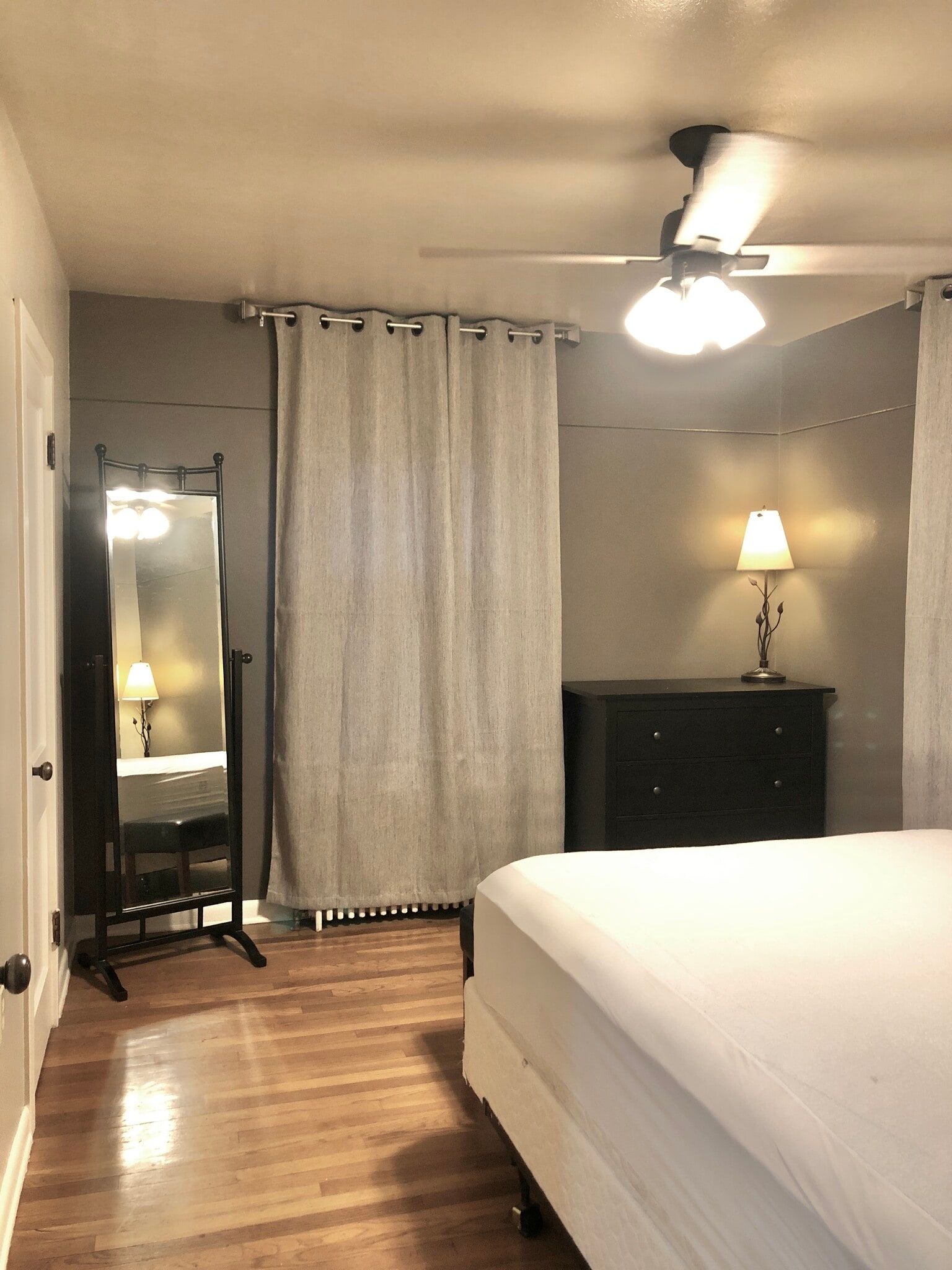 bedroom (unfinished) 2 large windows walk-in & built-in tall ceiling's ceiling fan - 110 N Vine St