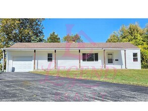 Building Photo - Charming 3-Bedroom with Huge Yard & Covered Patio