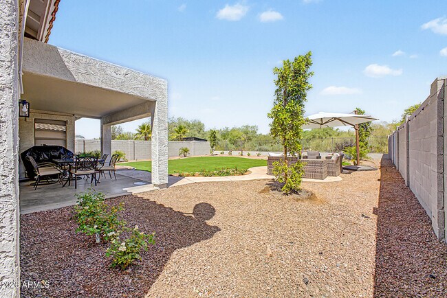 Building Photo - 10202 E Juanita Ave