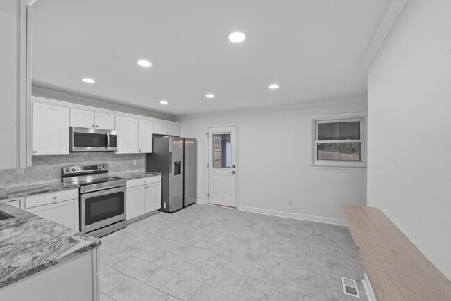 Building Photo - COMING SOON! Charming 3BR Home with Fenced Yard & Outdoor Living Space!