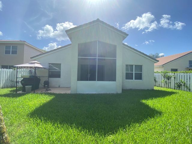 Building Photo - 6711 Stonecreek Street, Greenacres, FL 33413