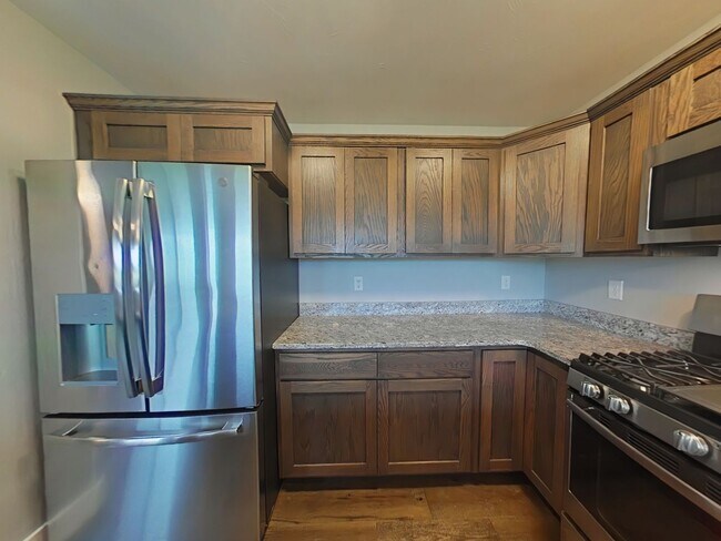 Building Photo - Stunning 3-bedroom, 2.5-bathroom condo with attached 2 stall garage!