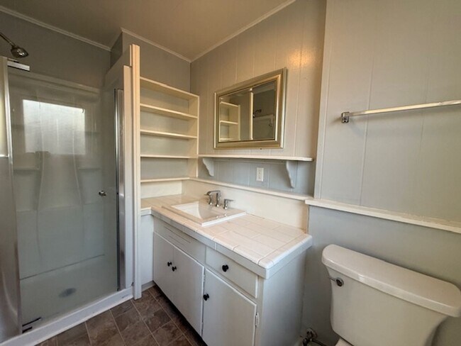 Building Photo - Updated ground floor unit in vintage duple...