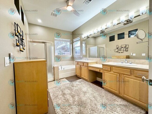 Building Photo - Open Kitchen, Expansive Living, and Covered Patio in Tranquil South Reno Near Trails, Parks & Sho...