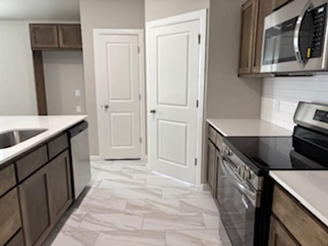 Building Photo - First Month Free! Beautiful New Home!