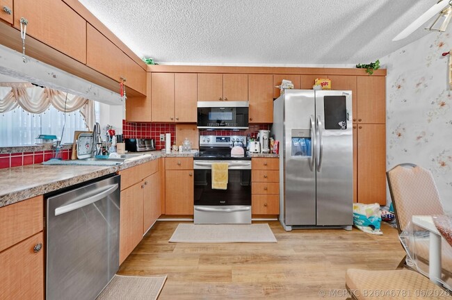 Building Photo - 4587 Carambola Cir S