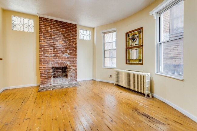 Building Photo - AVAILABLE June 2026 - Beautiful 4 Bedroom, 2 Bath Home w/ Front Porch Swing!