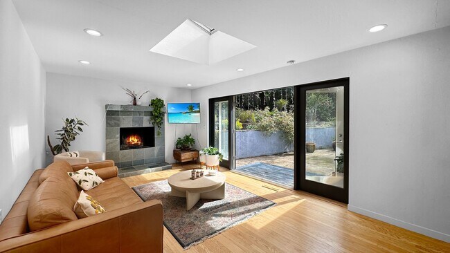 Building Photo - Light-Filled Home with Beautiful Garden & 2-Car Garage