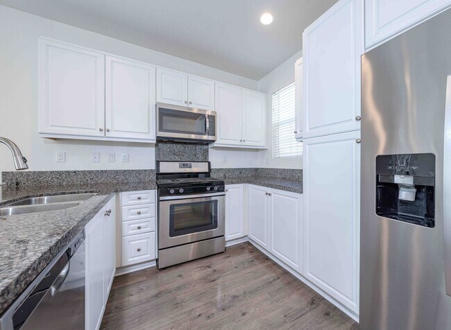 Building Photo - Modern, Move-In Ready Home with Attached 2-Car Garage