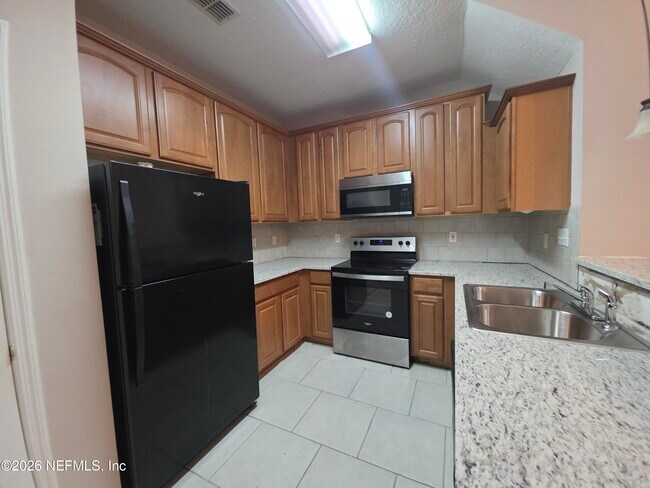 Building Photo - 6070 Bartram Village Dr