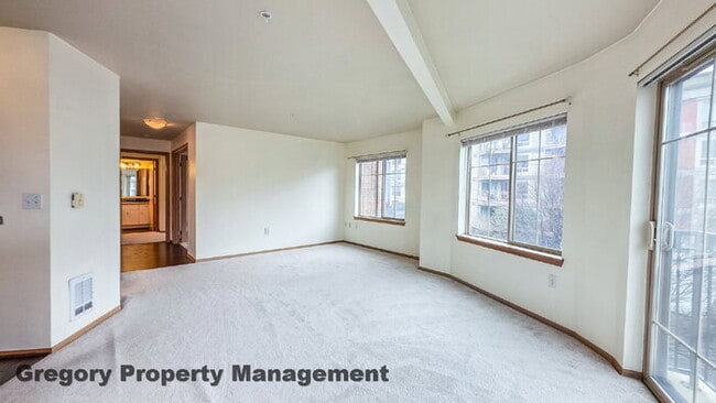 Building Photo - Sunny Capitol Hill 2 BR 1.5 BA Condo with Garage Parking Included & Skyline Views!