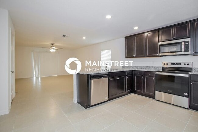 Building Photo - 4 Bedroom Pet-Friendly Home in Mascotte, FL with Main Street Renewal