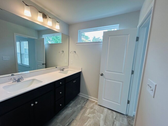 Building Photo - Stunning new end-unit 3 bedroom 2.5 bath townhouse in N High Point with attached garage.