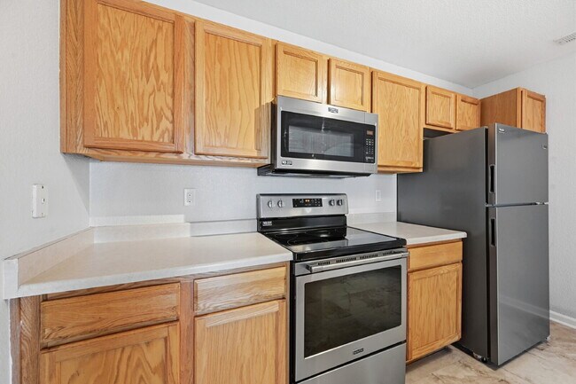 Building Photo - $1,595.95, 1 Bed, 1 Bath Condo in Aurora with In Unit Laundry and Pool Access!