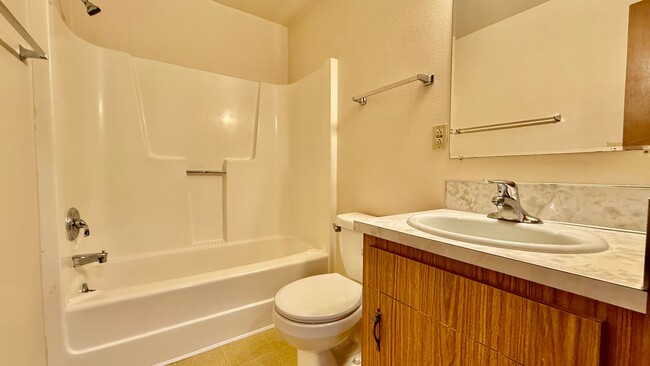 Building Photo - Two Bedroom Townhome with Yard & Attached ...