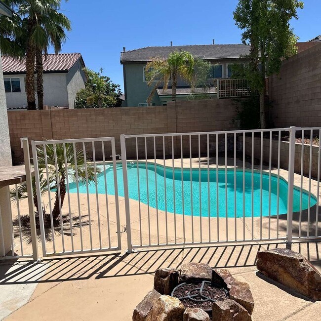 Building Photo - Spacious 4-Bedroom Retreat with Poolside O...