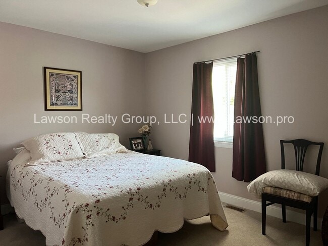Building Photo - Charming Brick Ranch with Beautifully Land...