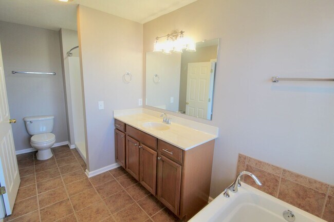 Building Photo - Upscale townhome  with attached garage for rent in the Townes at Bluestone!