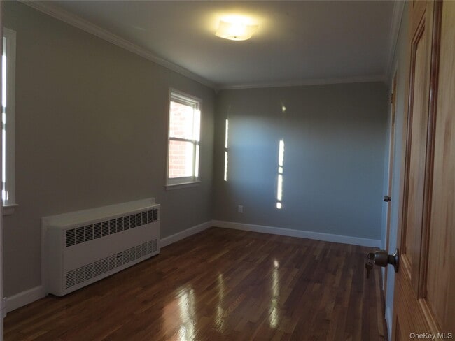 Building Photo - 208-09 Bardwell Ave
