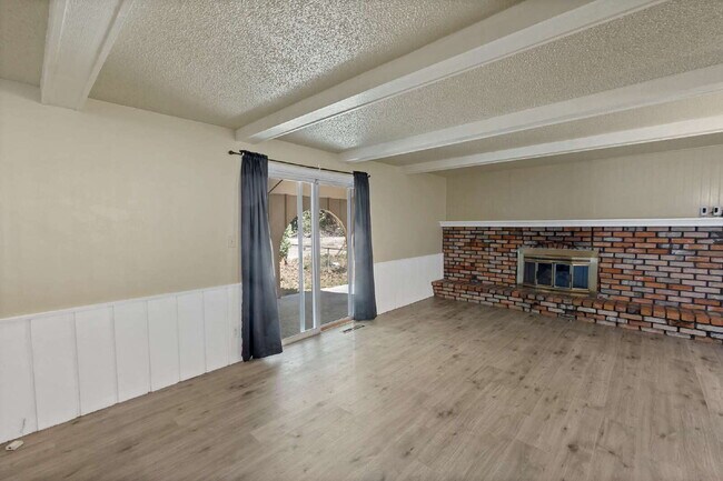 Building Photo - 3-Bedroom with A Flex Room Multi-Level Home with Fresh Paint, Refreshed Deck, and Multiple Living...
