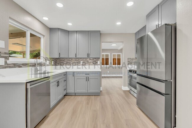Building Photo - Completely Renovated 4-Bedroom Home with M...