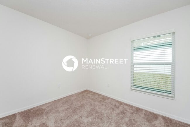 Building Photo - 4 Bedroom Pet-Friendly Home in Mascotte, FL with Main Street Renewal