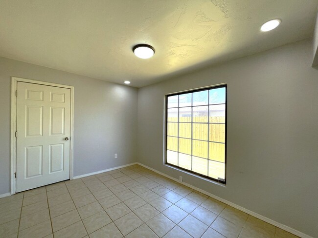 Building Photo - Welcome to this charming two-story single-...