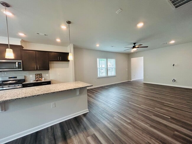 Building Photo - Applications pending! Stunning new end-unit 3 bedroom 2.5 bath townhouse in N High Point with att...