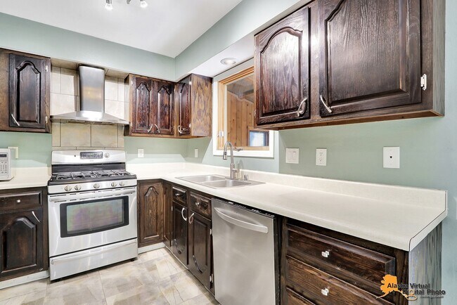 Building Photo - Eagle River Home w/ Fenced Yard, Sunroom, and Garage!