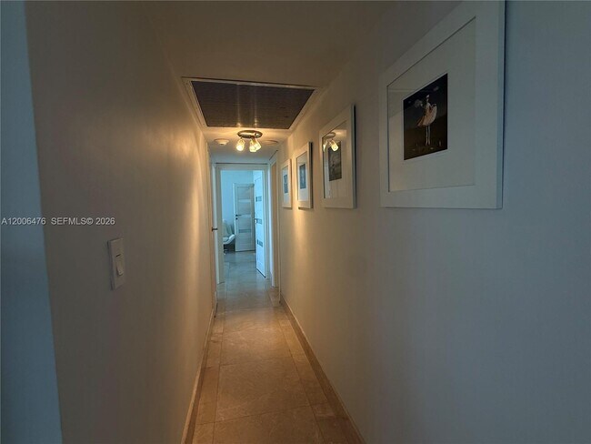 Building Photo - 10275 Collins Ave