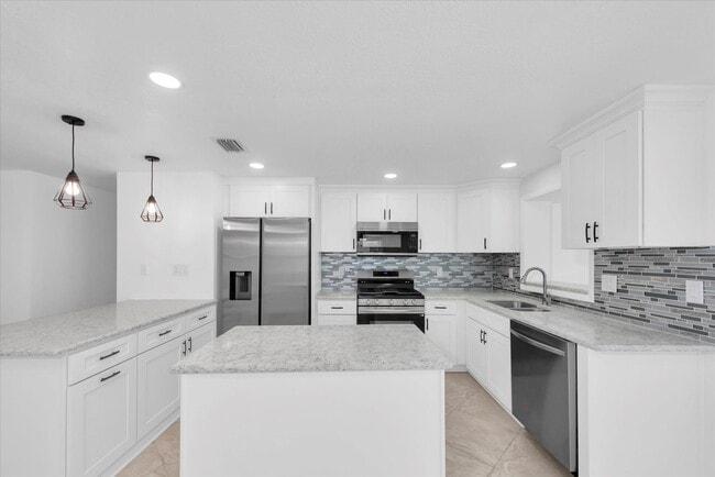 Building Photo - 5600 Bayou Grande Blvd NE